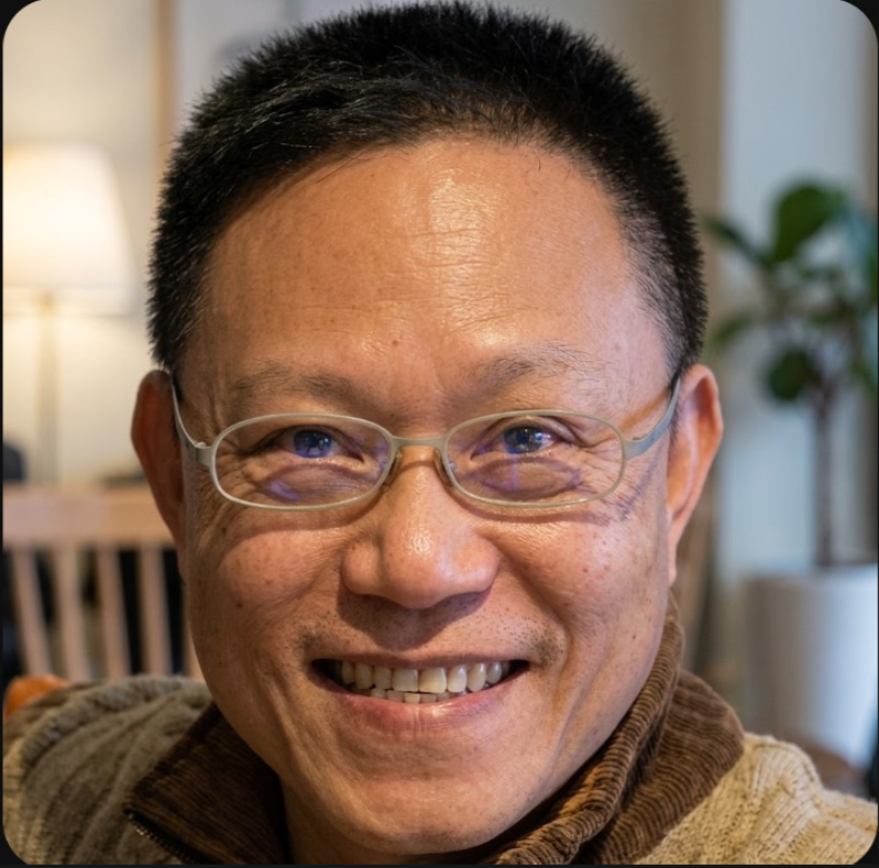 Paul Tsai in a business suit